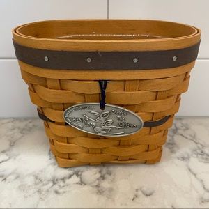 HENN 2005 Cherish the Children basket with plastic protector.